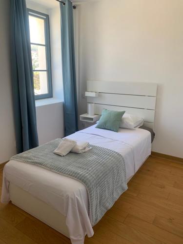 Postel nebo postele na pokoji v ubytování Les Hauts du Port-Appartement neuf sur le port