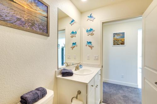 a bathroom with a sink and a mirror at Newly Built Sparks Home with Hot Tub 12 Mi to Reno! in Sparks