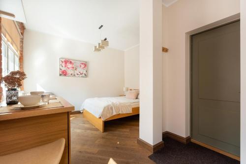 Postel nebo postele na pokoji v ubytování Rüütli Apartments in Tartu Old Town