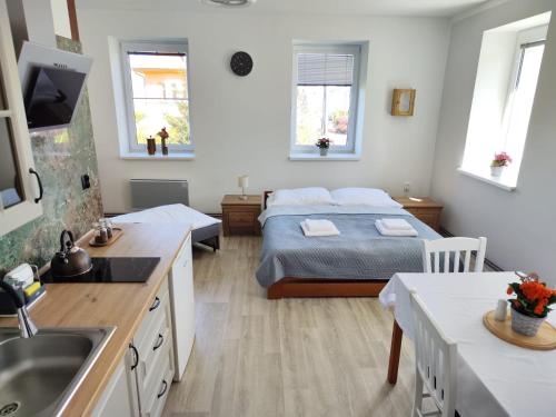 Voodi või voodid majutusasutuse Apartmány Goliáš toas