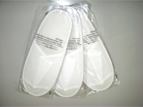 two white plastic bags sitting on a table at Hotel Axia Inn Kushiro - Vacation STAY 67235v in Irifunechō