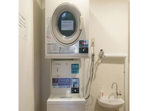 a medical machine in a bathroom with a sink at Hotel Axia Inn Kushiro - Vacation STAY 67207v in Irifunechō