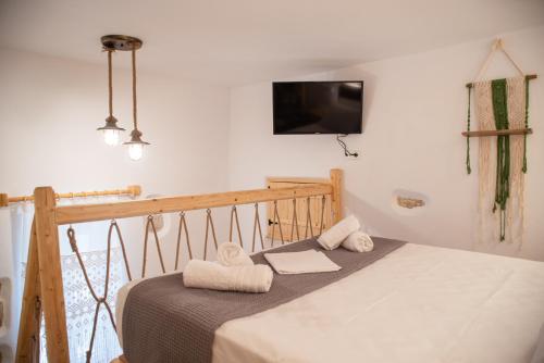 Ένα ή περισσότερα κρεβάτια σε δωμάτιο στο Mythical Luxury Apartment