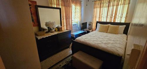 Katil atau katil-katil dalam bilik di Smitty's Home Away From Home