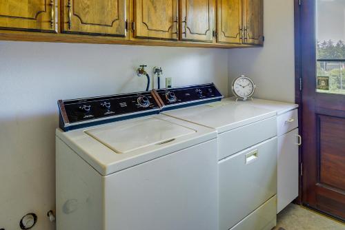 a kitchen with a sink and a dishwasher at Westport Retreat with Pool Table Walk to State Park in Westport