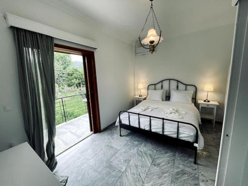 Postel nebo postele na pokoji v ubytování Orange Blossom Villa