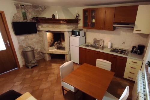 Kuchyň nebo kuchyňský kout v ubytování Apartments with a parking space Umag - 6995