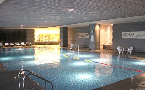 Kolam renang di atau dekat dengan Mels Weldon Evergreen Lake Hotel Heyuan