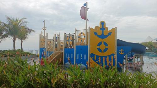a playground in a park with a slide at Imperium Resident Kuantan Eleven-7 in Kuantan