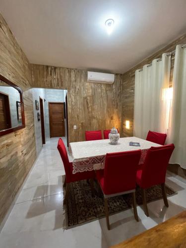 Ruang duduk di Queen House - Linda casa com piscina e area gourmet - Itaoca Praia - ES