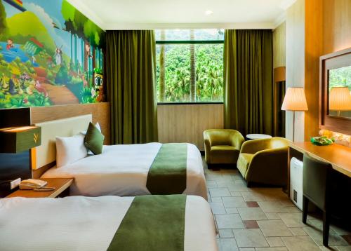 Postel nebo postele na pokoji v ubytování Uni-Resort Mawutu
