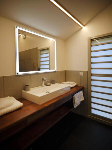 Et badeværelse på Le Jardin Maore