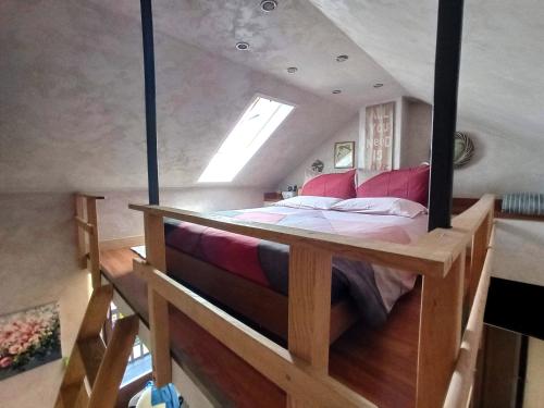 a bedroom with a large bed in a house at Private Romantic Wellness Lake View Retreat- Whirlpool Hammam Spa e Piscina panoramica in Maccagno con Pino e Veddasca