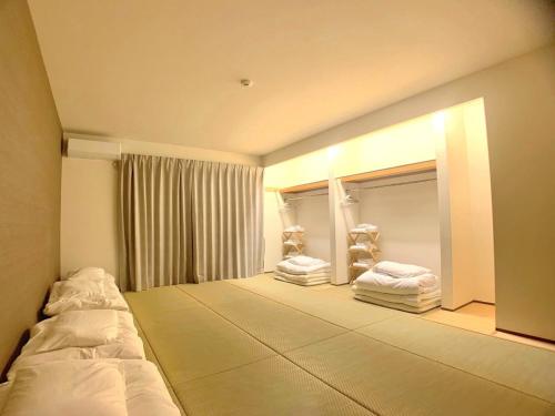 Krevet ili kreveti u jedinici u okviru objekta ＡＴＴＡ ＨＯＴＥＬ ＫＡＭＡＫＵＲＡ / Vacation STAY 76820