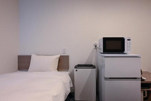 Μια τηλεόραση ή/και κέντρο ψυχαγωγίας στο HOTEL R9 The Yard Ashikagafukutomi