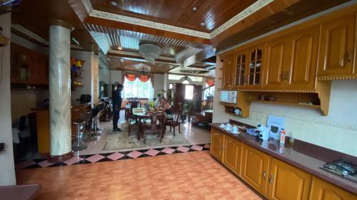 Majoituspaikan Samara Bohol City Villa keittiö tai keittotila