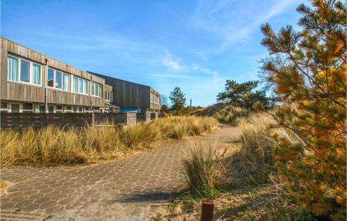 a building on the side of a road at Amazing Apartment In Schiermonnikoog in Schiermonnikoog