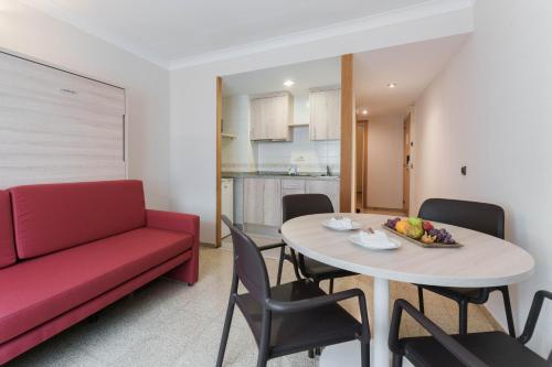  Hotel & Aparthotel Cosmos -  Room  picture :   Bath    Safety deposit box    TV                           