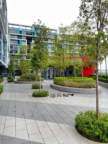 a building with a sign that says ride for west at Studio Unit - Little Fox Nest KLIA Sepang and Gamuda SplashMania in Sepang