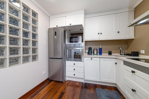 Cuisine ou kitchenette dans l'établissement HB Apartments - Mercado Central - Rambla Alicante - La Suite de la Playa