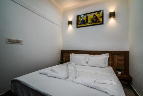 Ένα ή περισσότερα κρεβάτια σε δωμάτιο στο Kanasu StayHome