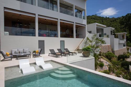 una imagen de una casa con piscina en Zog Villas, en Koh Samui 