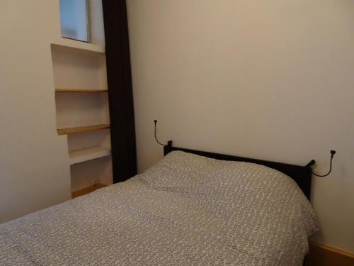 Кровать или кровати в номере Maison Noirmoutier-en-l'Île, 2 pièces, 4 personnes - FR-1-224B-1