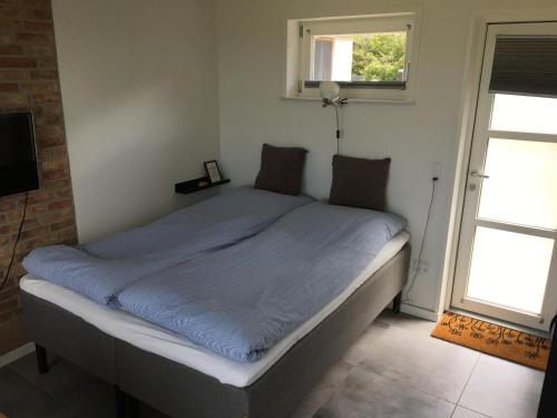 En eller flere senger på et rom på Casa Uno North - Nice appartement for two with sea view