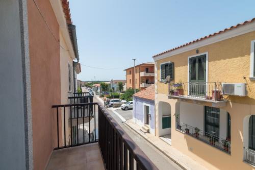 a view of a street from a balcony at Appartamento Rosmarino In The City Center - Happy Rentals in Santa Teresa Gallura