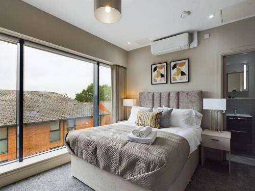 Katil atau katil-katil dalam bilik di Lesley House Apartments Belfast