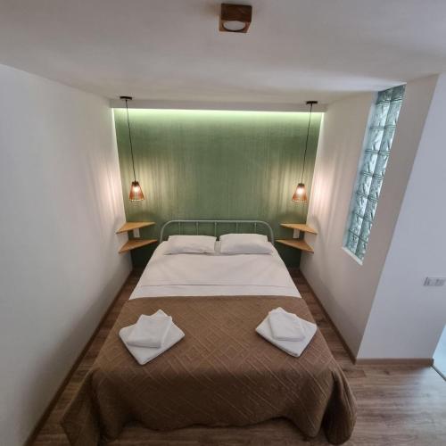 Postel nebo postele na pokoji v ubytování River House Boutique Hotel