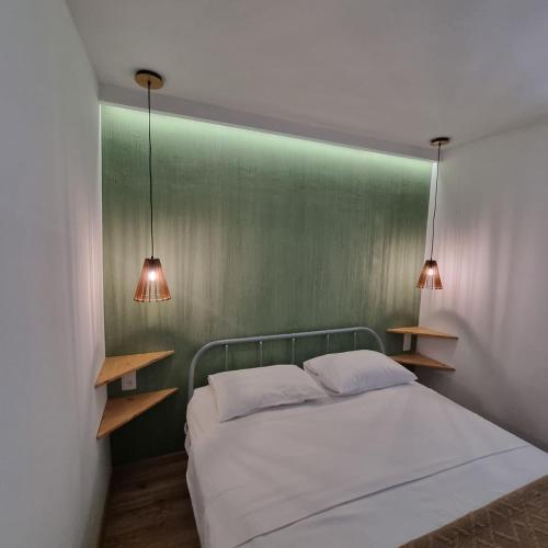 Postel nebo postele na pokoji v ubytování River House Boutique Hotel