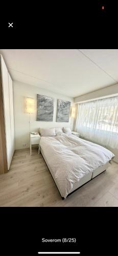Ένα ή περισσότερα κρεβάτια σε δωμάτιο στο Bjorli Apartment with everything, 150m from ski lift