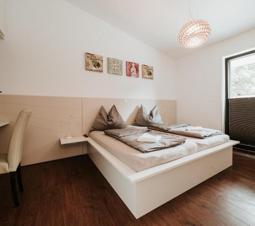 Postel nebo postele na pokoji v ubytování Haus Sommerfrische
