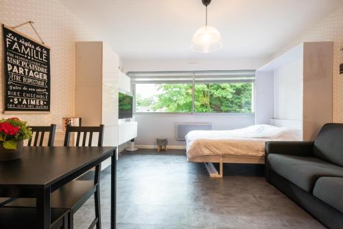Postel nebo postele na pokoji v ubytování Le Hardelot - Studio à 2 km de la plage