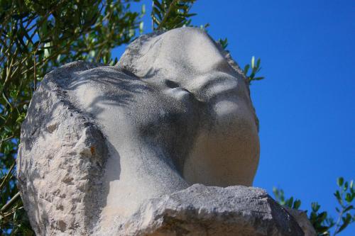 a statue of a woman looking up at the sky at Holiday Home Olea - Sun, Sea, Sport & Comfort in Splitska