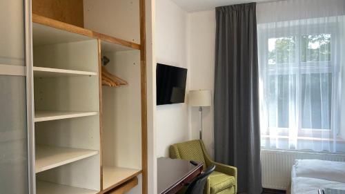 TV a/nebo společenská místnost v ubytování Aparthotel Slezák