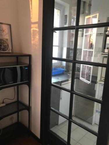 Posteľ alebo postele v izbe v ubytovaní Appart douillet Paris 11