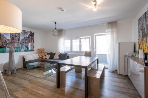 a living room with a couch and a table at Casa Merilana in Rust