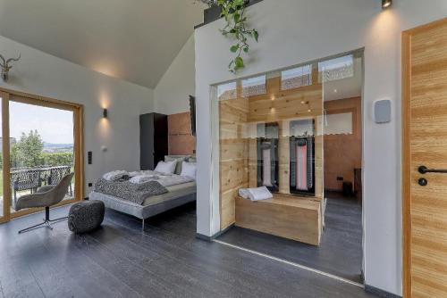 Ένα ή περισσότερα κρεβάτια σε δωμάτιο στο Chalet Romantik