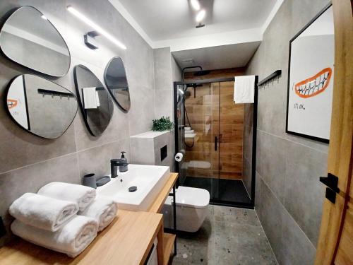 Koupelna v ubytování Kolory Warmii Apartamenty Garaż Podziemny