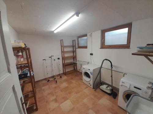 Kuchyň nebo kuchyňský kout v ubytování Im Naturgarten