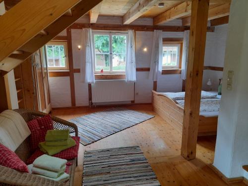 Postel nebo postele na pokoji v ubytování Im Naturgarten