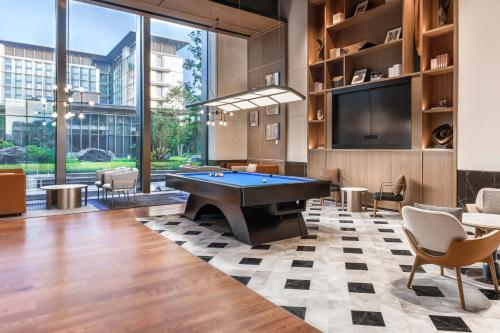 a billiard room with a pool table at Four Points by Sheraton Guangzhou, Baiyun in Guangzhou