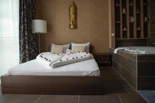 Postel nebo postele na pokoji v ubytování Caramell Premium Resort Superior