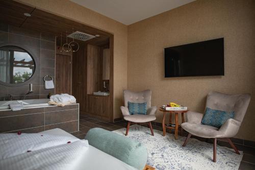 Postel nebo postele na pokoji v ubytování Caramell Premium Resort Superior