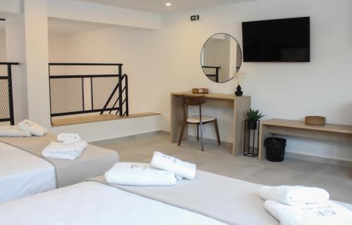 Ένα ή περισσότερα κρεβάτια σε δωμάτιο στο UrbanBay Hotel & Spa