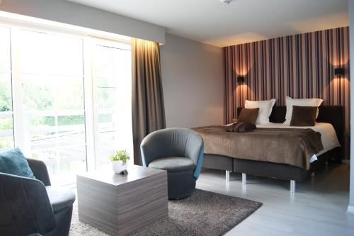 Postel nebo postele na pokoji v ubytování B&B Maison Kerkhove