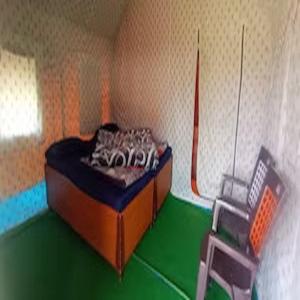 a model of a room with a bed and a chair at Himrab Chopta Resort in Chopta