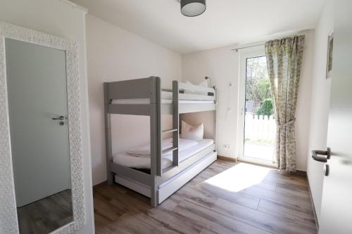 En eller flere senge i et værelse på Black Forest Hotel Kappel-Grafenhausen